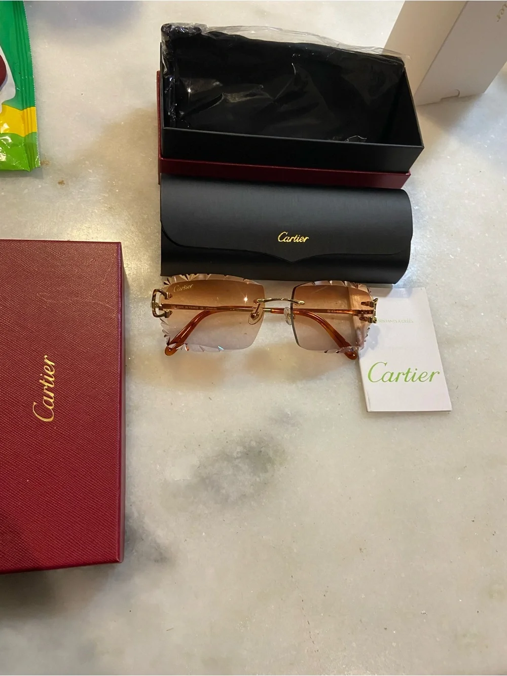 Cartier Rimless Sunglasses in Gold with Amber/Brown Lenses